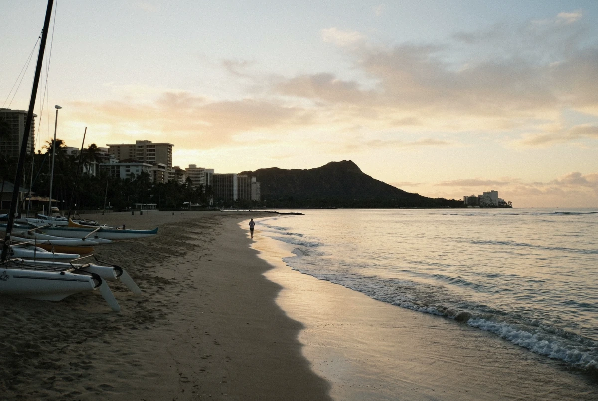 Waikiki Beach at sunrise with Diamond Head crater behind it, the signature backdrop of a Hawaii photoshoot on Oahu